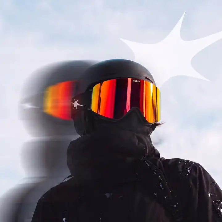 Rider in a black Astrïx goggle with a red mirror lens